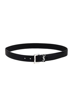 Find SAINT LAURENT Belt on Editorialist. Saint Laurent Belt in Black Grained genuine leather. Made in Italy. Measures approx 1H. Brushed silver-tone buckle closure. Interlocking logo hardware on front. SLAU-MA17. 634440 BRM0E. About the designer: SAINT LAURENT has been influencing and revolutionizing the fashion industry since the debut of its iconic ‘Rive Gauche’ collection in 1966 - the couture house was the first to create a ready-to-wear capsule. The sleek, precisely tailored staples, like the signature biker jackets, transcend seasons and trends. Creative Director Anthony Vaccarello continues to honor the label’s illustrious reputation by reintroducing cult styles, including the ‘Lou’ handbag and ‘Tribute’ sandals. Designer Silver Belt With Buckle Closure, Elegant Black Belt With Silver-tone Logo, Classic Leather Belt With Silver-tone Logo Plaque, Luxury Black Belt With Silver Buckle, Luxury Leather Belts With Silver Buckle, Leather Belt With Rectangular Tang Buckle, Leather Belt With Tang Rectangular Buckle, Designer Black Belt With Palladium Hardware, Designer Black Belt With Tang Buckle