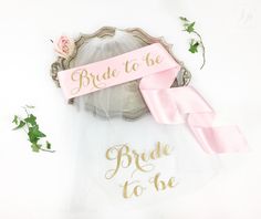 "Customize this satin sash and veil with your own colors and text! COVER PHOTO: Light Pink Sash with Gold Glitter lettering and Gold Glitter on the Veil ORDERING INFO: PLEASE LEAVE IN \"Notes To Seller\" BOX: 1) DATE NEEDED BY 2) TEXT/WORDING to appear on the sash AND/OR veil 3) SASH COLOR* * If purchasing the sash AND veil - Leave in notes the sash color (see sash color chart in photos above) PRODUCT INFO: SASH: - Custom Sash - For variations, please see our shop or send us a message! - Comes r Bridal Shower Veil, Sash Bachelorette, Bachelorette Veil, Bachelorette Sash, Pink Sash, Custom Sash, Bride To Be Sash, Wedding Veil Accessories, Lingerie Shower