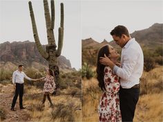 an engaged couple standing in front of a saguada tree at their desert engagement