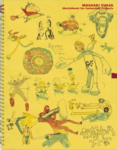 a yellow notebook with drawings on the front and back cover that reads masahi yusa sketchbook for animation project