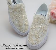 "Beautiful and Romantic wedding sneaker are a perfect accessories for your Special day..These Wedding  Slip On White Authentic Vans  Sneakers , are embellished with Ivory Lace fabric and Ivory applique  . Handmade to order, so please allow me enough time before your wedding date. Orders are processed and shipped within 6-7 WEEKS of payment., large orders may take longer ..Please allow an additional 2-5 days. Domestic Shipping will take 2-5 Business days.    This Item is not available for RUSH OR White Slip-on Wedding Shoes, Vans Shoes Wedding, Bridal Vans, Vans Wedding, Lace Vans, Sneakers For Bride, Ribbon Shoe Laces, Wedding Vans, Ribbon Shoes