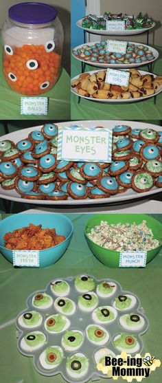 an assortment of desserts and snacks on display at a monster themed birthday party or baby shower