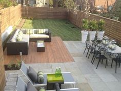 an outdoor patio with seating and tables