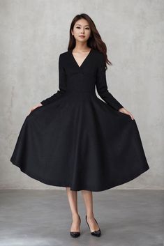 Stay cozy and stylish in timeless vintage wool dresses, perfect for winter soirées. These elegant pieces offer warmth and sophistication, making them ideal for any formal occasion. Embrace the charm of retro chic with midi styles that elevate your winter wardrobe.  ★★FEATURES 30% wool, other fiber, nylon Polyester lining Right side zipper  V neckline Long sleeve Fit and flare  Regular fit  Mid calf Perfect for winter,spring,autumn ★★ More color from Color4 of Wool fabric swatch https://etsy.me/37PMzfD ★★Mode size Height 170 cm (5′ 6″) Bust 90 cm (35") Waist 70 cm (27") She wears size S. ★★ Custom order selecttion Request other color Request Change the Length Request Change the sleeve length Your height is not between 155cm- 175cm Your weight is not between 47kg -77kg ★★ Get your size in Si Wool Fabric Swatch, Modest Formal Dress, Winter Dress Women, Wool Dresses, Formal Midi Dress, Modest Formal Dresses, Cocktail Dresses For Women, Custom Dress, Dress Winter