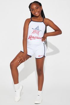 Available In White. Matching Short Set Screen Print Cami Top Short Shorts Contrast Trim Cotton & Spandex Model Wears Size 10/12 Mommy & Me Takedown of "America Rocks Short Set" Imported | Mini America Rocks Short Set in White size 10/12 by Fashion Nova Summer Cheerleading Bottoms, Bad Kids, Service Women, Kids Set, Short Set, Short Shorts, Matching Dresses, White Fashion, Contrast Trim