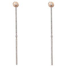 Showcasing these enchanting Messika 2 Barrettes Gatsby long drop earrings, crafted in 18K rose gold. These earrings feature pave set round brilliant cut sparkling diamonds weighing 1.26 carats. Diamond quality: color G and clarity VS. Earring length: 3 inches. Width: 1.6mm. Total weight: 5.12 grams. Secured with push back post closure. Perfect jewelry to match your outfit or as a gift for your lover. Comes with the original box and paper. Long Drop Earrings, Sparkle Diamonds, Barrettes, Gatsby, 18k Rose Gold, Round Brilliant, Or Rose, Original Box, Jewelry Earrings