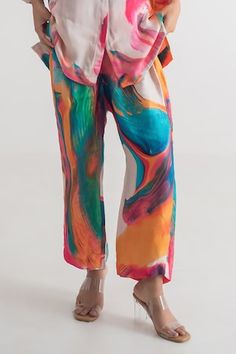 Multi-colored modal silk shirt with abstract print. Comes with pant. - Aza Fashions Multicolor Silk Sets For Summer, Multicolor Silk Summer Sets, Multicolor Straight Pants Sets For Summer, Multicolor Summer Sets With Straight Pants, Summer Multicolor Sets With Straight Pants, Spring Multicolor Abstract Print Bottoms, Summer Silk Printed Pants, Summer Multicolor Viscose Set, Color Abstract