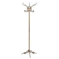 a metal coat stand with three arms and two candles on it's legs, against a white background