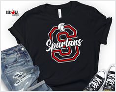 Personalized Spartans School Spirit T-Shirt Football, Baseball, Basketball, Softball, Track, Volleyball, Cross Country, Cheer, Wrestling Not all colors are available in youth sizes. Please check the color/size charts in photos. The perfect way to show your school spirit! This lightweight and super soft tee is everyone's favorite style. Size and color charts are available in the product photos. We do our best to accurately represent shirt colors by using actual photos but do understand that all m Softball Cheer, Represent Shirt, Shirt Football, Football T Shirt, Baseball Softball, Color Charts, School Spirit, Cross Country, Product Photos