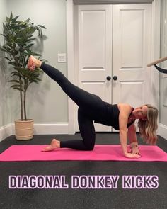 a woman doing a yoga pose in front of a door with the words diagonal donkey kicks on it