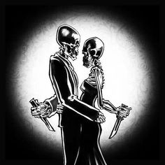 a couple dressed up as skeleton bride and groom