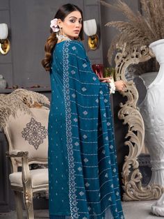 Brand: ManizayProduct Code: Talash D-04Collection: Manizay Talash Premium Embroidered Lawn CollectionFabric: Lawn DESIGN DETAILS: Embroidered Lawn Shirt Embroidered Chiffon Dupatta Dyed Trouser DISCLAIMER:* Lining, Laces, and Tassels are not included in unstitched variants.* Embellishment items in stitched outfits are subject to market availability.* Product color may vary due to photographic lighting or your device settings. CARE INSTRUCTIONS: Extra Fabric Has Been Used For Shoot Original Color Lawn Design, Alkaram Studio, High End Shoes, Embroidered Chiffon, Gul Ahmed, Sana Safinaz, Lawn Shirts, Chiffon Dupatta, Online Shopping Websites