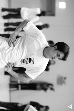 a young man is practicing his moves in the gym