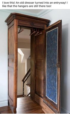 an open wooden door in the corner of a room