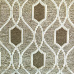 an upholstered wallpaper pattern with white and brown geometric shapes on it's surface