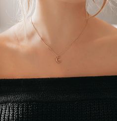 "Crescent Moon necklace is simple, unique and perfect for layering or on it's own. The curves and edges of the tiny moon pendant catches and reflects the light to add sparkle to your days and nights. Unique multi faceted moon pendant is shiny on the outside and matte on the inside. This is not your average moon charm, it is a unique 3d half moon edge to give it depth and reflect light beautifully. Model is wearing 17\" necklace. D E T A I L S * Tiny Moon Pendant Size: approximately 15mm x 11mm * Minimalist Half Moon Phase Necklace, Minimalist Jewelry With Moon Charm, Minimalist Moon Shape Charm Necklace With Clavicle Chain, Minimalist Moon Charm Necklace With Delicate Chain, Rose Gold Moon Charm Necklace, Rose Gold Moon Necklace With Moon Charm, Minimalist Rose Gold Moon-shaped Jewelry, Minimalist Moon Charm Round Pendant Necklace, Minimalist Moon Charm Necklace With Round Pendant