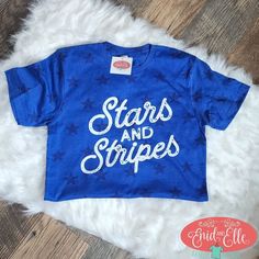 a blue shirt that says stars and stripes on it