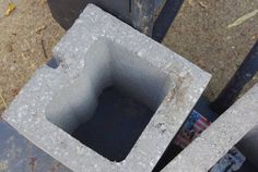 two cement blocks sitting next to each other