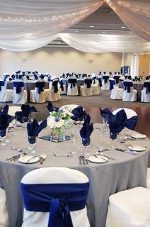 an image of a wedding venue with blue and white decorations