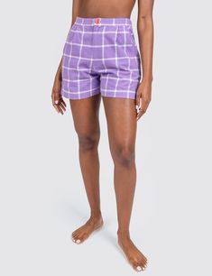 This high-waisted shorts style is cute and flattering. Features two side pockets, two back pockets, an elastic back waistband for a comfort fit, and a front zipper with candy red button closure. Constructed with 100% cotton fabric, custom made in France. Mix & match your look with more Grid Collection styles 100% cottonPreshrunk, true to sizeUnisex sizes Mini- 4XL Naomi is 5' 7" and wears size S Made in Los Angeles, California Daywear Bottoms With Built-in Shorts, Elastic Waistband Knee-length Loungewear Shorts, Knee-length Loungewear Shorts With Elastic Waistband, Fitted Cotton Shorts With Side Pockets, Fitted Shorts For Loungewear With Short Inseam, Trendy Cotton Knee-length Shorts, Trendy Short Length Cotton Shorts, Fitted Pajama Shorts With Elastic Waistband, Cotton Knee-length Pajama Shorts For Loungewear