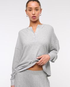 Slim-fitting long-sleeve henley top in our soft cozy lounge fabric and oversized-fit silhouette, featuring a button-up neckline and all-over textured detail. Cozy Lounge, Henley Top, Women's Tops, Oversized Fits, Abercrombie Fitch, Women Long Sleeve, Light Grey, Button Up, Lounge