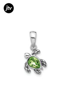 Rhodium over sterling silver polished and antiqued August birthstone turtle pendant with green crystal. Measures approximately 3/4"L x 3/8"W. Silver Charms Jewelry For May Birthstone, Silver Jewelry With May Birthstone Charms, Silver Jewelry With Charms For May Birthstone, Green Sterling Silver Jewelry With Oxidized Finish, Green Oxidized Sterling Silver Jewelry, Silver Sterling Silver Turtle Jewelry, May Birthstone Jewelry In Silver With Peridot, Polished Peridot Jewelry For May Birthstone, Nickel-free Silver Peridot Jewelry