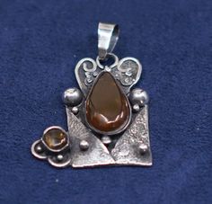 Vintage Sterling silver handmade pendant, solid 925 silver Bali with amber center details, stamped 925 signed memo hamacatic Savannah Ga, Handmade Pendant, Handmade Pendants, Vintage Sterling Silver, Savannah, Handmade Silver, Pendant Necklaces, 925 Silver, Bali