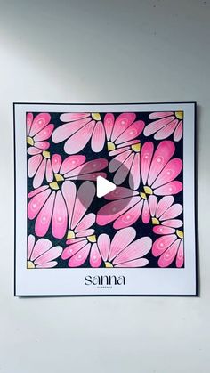 a pink and black flower print with the word sema written in front of it