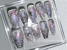 "✨ Adorn your nails with the allure of the cosmos. Our holographic purple press-on nails are a symphony of elegance and sophistication. Each nail boasts a captivating hue that dances with celestial charm, reflecting a luxurious purple shimmer akin to distant galaxies.💅 🎀 Embellished with meticulously crafted silver gel lines forming radiant bows, these nails exude opulence. The sparkling silver accents cascade across the holographic backdrop, adding a touch of glamour and allure to your finger Nail Art Y2k, Nails Silver Glitter, Purple Press On Nails, Art Y2k, Purple Nail Art, Fake Nails Designs, Nails Silver, Purple Nail, Blush Nails