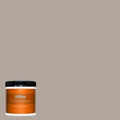 the behr paint color is shown in an orange and gray hue with black accents