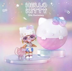 a hello kitty figurine is posed next to an egg with sunglasses on it