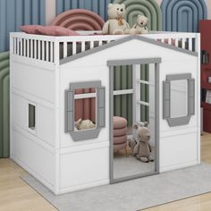 there is a doll house with two teddy bears in it