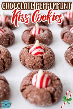 chocolate peppermin kiss cookies with candy canes on top