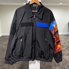 Dries Van Noten Spring Summer 2021 Black Len Lye Edition Velcro Patch Jacket Size Large (Oversized Fit; See Measurements) Brand New W/ Tags Polyester & Nylon Material Extremely Rare Dries Piece Retailed At $1230 Measurements: Chest: 28” Length: 29” Shoulders: 24.25” Sleeve Length: 26” Black Techwear Outerwear With Patch Pockets, Designer Black Spring Outerwear, Designer Black Outerwear For Spring, Designer Spring Streetwear Outerwear, Designer Streetwear Outerwear For Spring, Thrift Board, Patch Jacket, Velcro Patches, Patches Jacket