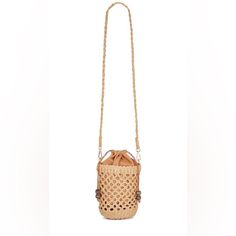 Stylish And Oh So Cute, The Sayulita Bag Is A Natural Canvas And Basket Bag Featuring An Interior Canvas Pouch And Drawcord Accented With Wooden Beads, And Adjustable Strap.. Sold Out Everywhere Natural Canvas/Basket Bag Wooden Beads Interior Canvas Pouch W/ Drawcord 22.5" Strap, 18" Circumference Material: Paper Raffia Crossbody Casual Romantic Bohemian Boho Vacation Woven Leather Pouch Shoulder Bag, Woven Leather Pouch Shoulder Bag For Vacation, Beige Crossbody Straw Bag With Bamboo Handle, Travel Crossbody Bucket Bag With Bamboo Handle, Brown Crossbody Straw Bag With Bamboo Handle, Beige Crossbody Bag With Bamboo Handle, Travel Pouch Straw Bag With Woven Leather, Summer Pouch Straw Bag With Woven Leather, Summer Woven Leather Straw Pouch Bag