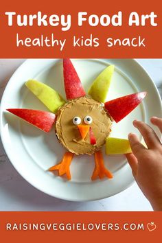 a turkey made out of food on a white plate with text overlay that reads, turkey food art healthy kids snack