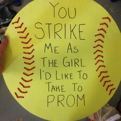 a hand holding up a yellow paper sign that says you strike me as the girl i'd like to take to prom