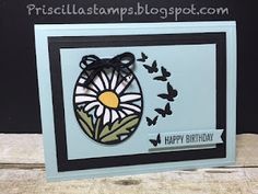 a handmade card with a flower and butterflies on it, which reads happy birthday