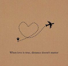 an airplane is flying in the sky with a heart on it's tail and words written below