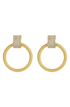 Shimmering pavé crystals illuminate the huggies on these 22-karat gold-plated earrings with brushed hoops bringing additional elegance to this look. 1 1/8" drop; 1" width 22k-gold plate/cubic zirconia Imported Modern Gold Hoop Earrings With Pave Setting, Drop Hoop Earrings, Gold Plated Earrings, 22k Gold, White Topaz, Dean, Topaz, Cubic Zirconia, Gold Plate