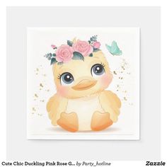 a cute little duckling with flowers on its head sitting in front of a white background