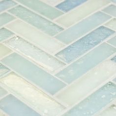 blue and white glass tile on the floor