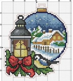 a cross stitch christmas ornament with a lantern