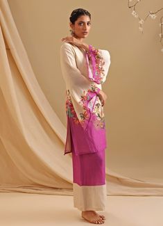 This elegant Cream silk kurta features vibrant floral prints and delicate thread embroidery on the hem and sleeves, adding a touch of sophistication. Paired with a contrasting colorblock flared pant, it offers a chic blend of traditional and modern design. Composition : Kurta and Pant - Malaysian Silk Care: Dry Clean Only and Vacuum Storage Delivery : 2-4 weeks as the product is hand crafted. Check Size Guide or choose MySize for free customisation (All Sizes above XL can be made at 15% additional cost) For more information and sizes please contact fabiliciousfashion@gmail.com or visit our Copenhagen studio. About the Designer : Soup by Sougat Paul is celebrated for its beautiful Indowestern styles. Discover stunning sarees, kurtas, and chic fusion wear like jumpsuits, skirt sets, and pala Sougat Paul, Fusion Wear, Design Composition, Vacuum Storage, Indian Wedding Wear, Silk Kurta, Cream Silk, Thread Embroidery, Skirt Sets