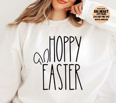 a woman wearing a happy easter sweatshirt