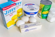 eggs, yogurt, butter, and other ingredients on a counter top for making frozen desserts