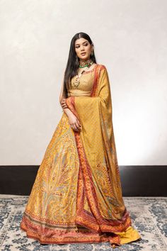 Yellow Color Swarovski Work Wedding Lehenga – Panache Haute Couture Semi-stitched Gold Anarkali Set With Motifs, Gold Lehenga With Intricate Embroidery In Jamawar, Gold Semi-stitched Jamawar Lehenga, Gold Jamawar Lehenga With Intricate Embroidery, Yellow Anarkali Set With Intricate Embroidery In Dola Silk, Yellow Dola Silk Anarkali Set With Intricate Embroidery, Semi-stitched Gold Jamawar Lehenga, Gold Jamawar Bollywood Lehenga, Yellow Semi-stitched Banarasi Silk Sets