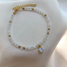 Moonstone Gold Filled Bracelet. Delicate Crystal Bracelet. - Etsy Moonstone Bracelet With Moon Charm As Gift, Elegant Moonstone Beaded Bracelets As Gift, Elegant Moonstone Beaded Bracelet As Gift, Spiritual Gold Beaded Bracelets With Moonstone, Adjustable Elegant Moonstone Beaded Bracelets, Handmade Dainty Moonstone Beaded Bracelets, Minimalist Handmade Moonstone Beaded Bracelets, Minimalist Handmade Beaded Bracelet With Moonstone, Handmade Minimalist Moonstone Beaded Bracelet