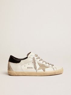 Super-Star sneakers with black heel tab and metal stud lettering | Golden Goose Golden Family, Exclusive Sneakers, Golden Goose Sneakers, Glitter Heels, Sole Sneakers, Black Heel, Star Sneakers, Super Star, Black Leather Heels