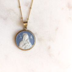 Our Lady of Perpetual Help Cameo in Blue — Unique Catholic Jewelry - Telos Art Handmade Blue Medallion Necklace, Blue Medallion Spiritual Necklaces, Spiritual Blue Medallion Necklaces, Blue Cameo Jewelry Gift, Blue Medallion Necklace For Spiritual Style, Our Lady Of Perpetual Help, Lady Of Perpetual Help, Catholic Necklace, Catholic Jewelry